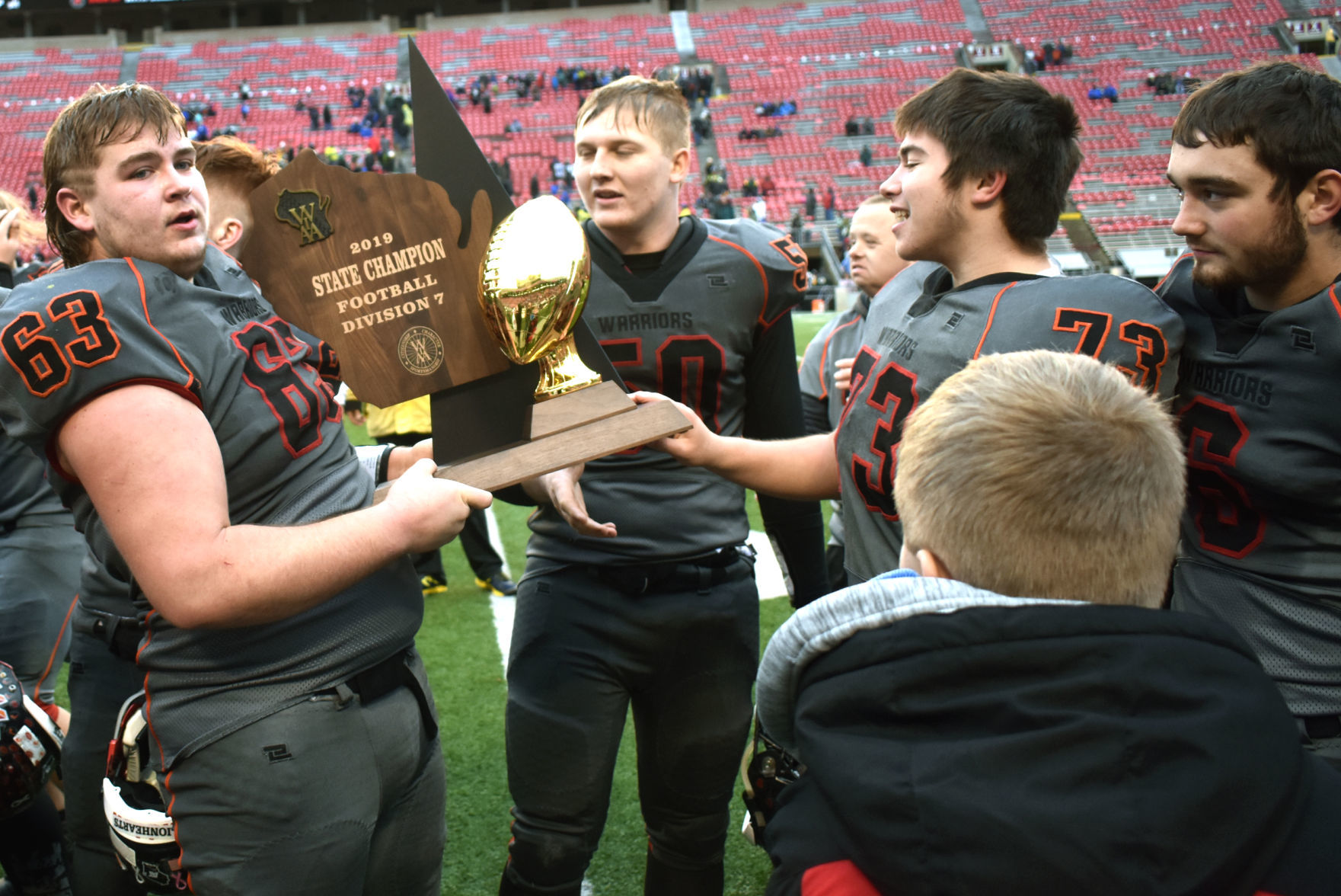 WIAA state football photo: Black Hawk/Warren players celebrate their victory